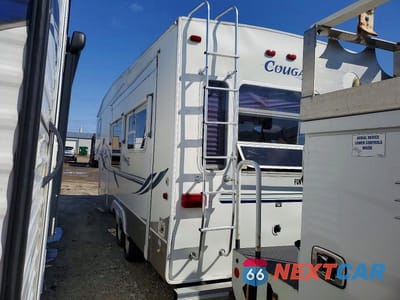 Trzecie zdjęcie samochodu z tyłu: 2003 KEYSTONE COUGAR CAMPER VIN:4YDF2762032034726 - miniatura