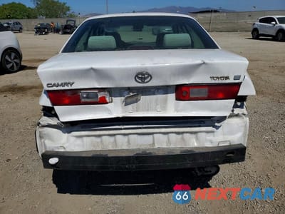 Zdjęcie 6 z 13 samochodu: 1997 TOYOTA CAMRY LE VIN:JT2BG22K1V0049416 - miniatura