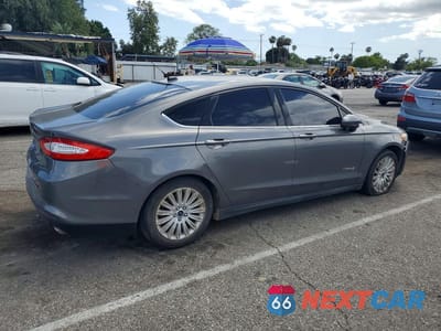 Trzecie zdjęcie samochodu z tyłu: 2014 FORD FUSION S HYBRID VIN:3FA6P0UU1ER221252 - miniatura