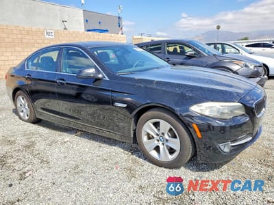 Czwarte zdjęcie samochodu z boku: 2012 BMW M5 VIN:WBAXG5C57CDY28670 - miniatura