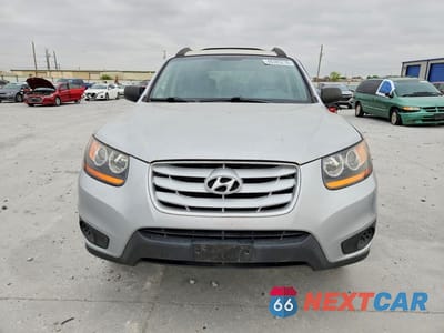 Piąte zdjęcie samochodu w środku: 2010 HYUNDAI SANTA FE GLS VIN:5NMSG3AB8AH402162 - miniatura