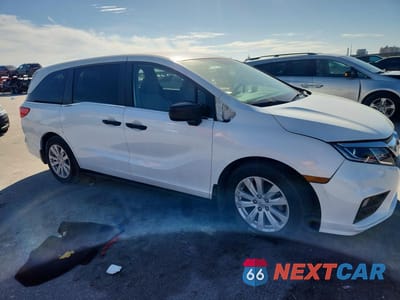 Czwarte zdjęcie samochodu z boku: 2019 HONDA ODYSSEY LX VIN:5FNRL6H23KB049236 - miniatura