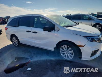 Czwarte zdjęcie samochodu z boku: 2019 HONDA ODYSSEY LX VIN:5FNRL6H23KB049236 - miniatura