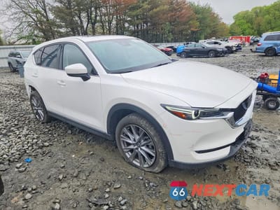 Czwarte zdjęcie samochodu z boku: 2021 MAZDA CX-5 GRAND TOURING VIN:JM3KFBDM1M1493467 - miniatura