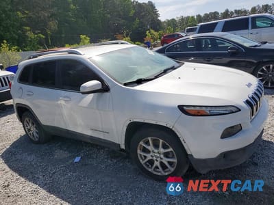 Czwarte zdjęcie samochodu z boku: 2014 JEEP CHEROKEE LATITUDE VIN:1C4PJLCS0EW123070 - miniatura
