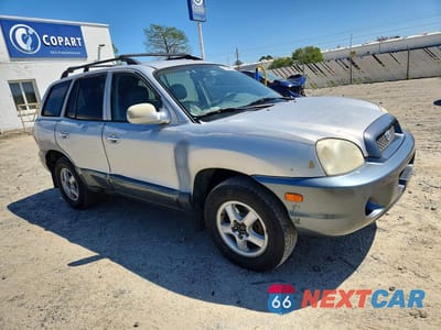 Czwarte zdjęcie samochodu z boku: 2001 HYUNDAI SANTA FE GL VIN:KM8SC83D61U021549 - miniatura
