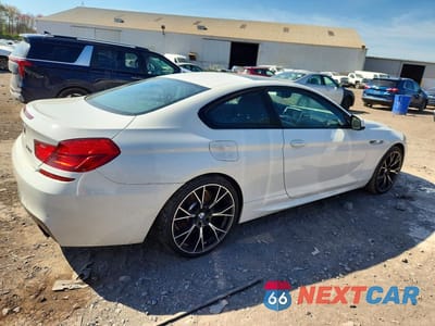 Trzecie zdjęcie samochodu z tyłu: 2015 BMW 640 I VIN:WBALW3C5XFC892928 - miniatura