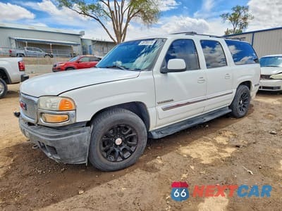 2001 GMC YUKON XL K1500 3GKFK16T61G252476 - główne zdjęcie licytacji z USA - miniatura