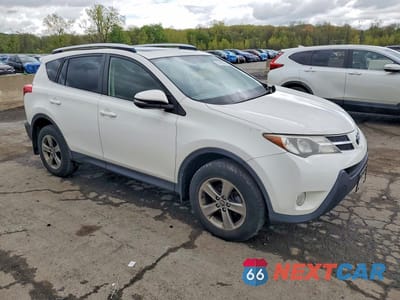 Czwarte zdjęcie samochodu z boku: 2015 TOYOTA RAV4 XLE VIN:JTMRFREV7FD126632 - miniatura
