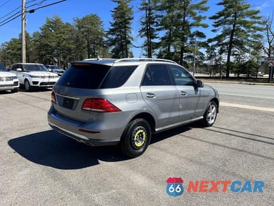 Czwarte zdjęcie samochodu z boku: 2016 MERCEDES-BENZ GLE 350 VIN:4JGDA5JB4GA693201 - miniatura