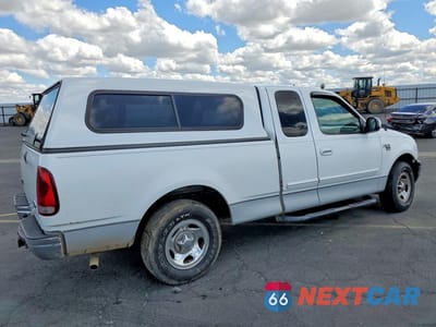 Trzecie zdjęcie samochodu z tyłu: 2002 FORD F150 VIN:1FTRX17L82NB30364 - miniatura