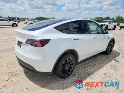 Trzecie zdjęcie samochodu z tyłu: 2023 TESLA MODEL Y VIN:7SAYGDEE1PA076266 - miniatura