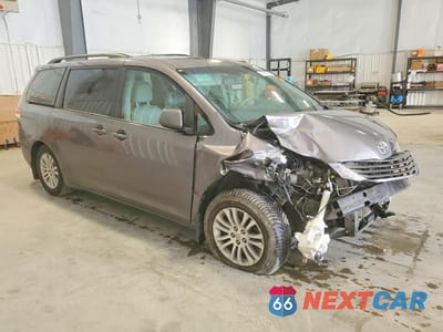 Czwarte zdjęcie samochodu z boku: 2011 TOYOTA SIENNA XLE 8-PASSENGER VIN:5TDYK3DC3BS040656 - miniatura