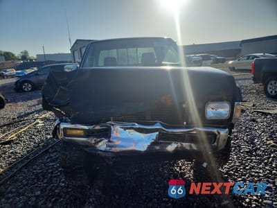 Piąte zdjęcie samochodu w środku: 1994 NISSAN TRUCK XE V6 VIN:1N6HD16Y1RC398077 - miniatura