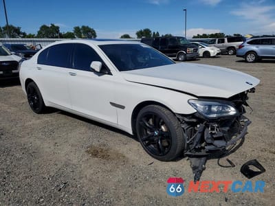 Czwarte zdjęcie samochodu z boku: 2014 BMW 750 LI VIN:WBAYE8C53ED134587 - miniatura