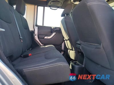 Zdjęcie 10 z 12 samochodu: 2013 JEEP WRANGLER UNLIMITED SAHARA VIN:1C4BJWEG5DL617770 - miniatura
