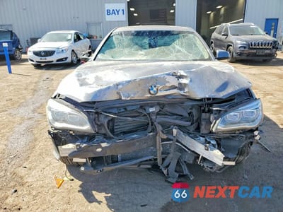 Piąte zdjęcie samochodu w środku: 2013 BMW 750 LXI VIN:WBAYF8C53DD140398 - miniatura
