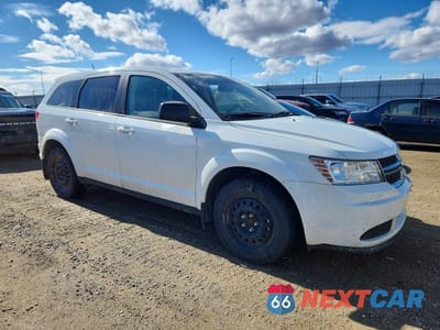 Czwarte zdjęcie samochodu z boku: 2016 DODGE JOURNEY SE VIN:3C4PDCAB1GT122402 - miniatura