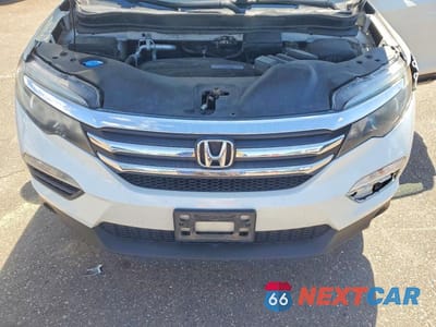 Zdjęcie 12 z 14 samochodu: 2016 HONDA PILOT EXL VIN:5FNYF5H59GB036649 - miniatura
