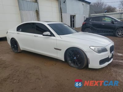 Czwarte zdjęcie samochodu z boku: 2014 BMW 750 LI VIN:WBAYE8C59ED135551 - miniatura