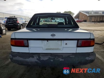 Zdjęcie 6 z 11 samochodu: 1992 NISSAN SENTRA E VIN:1N4EB32A0NC742076 - miniatura