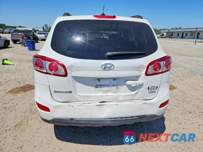 Zdjęcie 6 z 13 samochodu: 2012 HYUNDAI SANTA FE VIN:5XYZGDAB0CG098844 - miniatura
