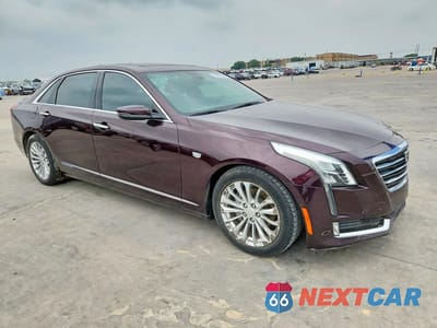 Czwarte zdjęcie samochodu z boku: 2017 CADILLAC CT6 PREMIUM LUXURY HYBRID VIN:LREKK5RX2HA055668 - miniatura