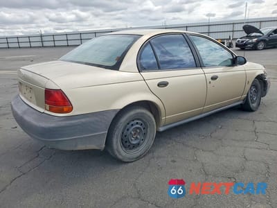Trzecie zdjęcie samochodu z tyłu: 1999 SATURN SL1 VIN:1G8ZH528XXZ147250 - miniatura