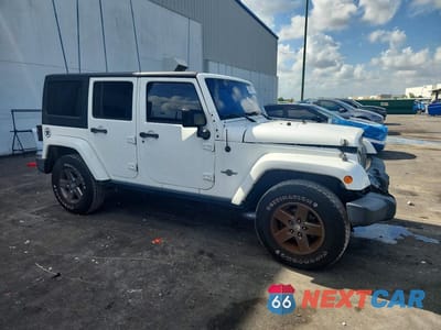 Czwarte zdjęcie samochodu z boku: 2015 JEEP WRANGLER UNLIMITED SPORT VIN:1C4BJWDG1FL572816 - miniatura