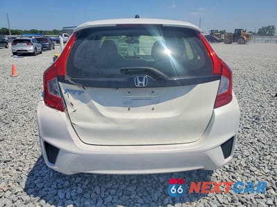 Zdjęcie 6 z 11 samochodu: 2017 HONDA FIT LX VIN:JHMGK5H55HS021818 - miniatura