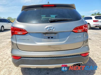 Zdjęcie 6 z 14 samochodu: 2013 HYUNDAI SANTA FE SPORT 2.0T VIN:5XYZW3LA8DG062404 - miniatura