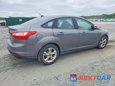 Trzecie zdjęcie samochodu z tyłu: 2014 FORD FOCUS SE VIN:1FADP3F20EL438083 - miniatura