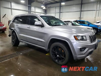 Czwarte zdjęcie samochodu z boku: 2014 JEEP GRAND CHEROKEE LAREDO VIN:1C4RJFAG5EC496695 - miniatura