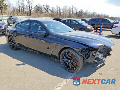 Czwarte zdjęcie samochodu z boku: 2022 BMW M850XI VIN:WBAGV8C06NCH89562 - miniatura