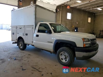 Czwarte zdjęcie samochodu z boku: 2005 CHEV SILVERADO SS EXTENDE VIN:1GCHK24U45E136857 - miniatura