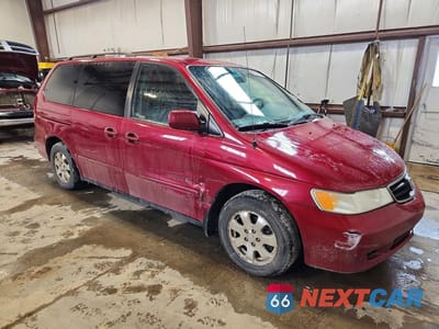 Czwarte zdjęcie samochodu z boku: 2002 HONDA ODYSSEY EXL VIN:2HKRL18062H013897 - miniatura