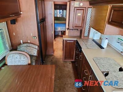 Zdjęcie 6 z 10 samochodu: 2001 WINNEBAGO MOTORHOME VIN:4UZAAHAK41CJ36093 - miniatura