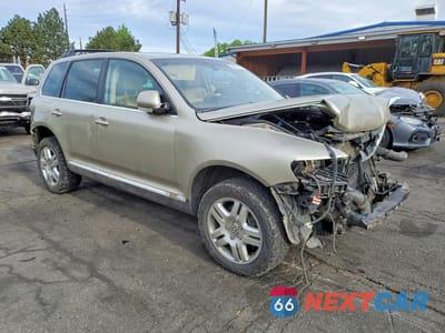 Czwarte zdjęcie samochodu z boku: 2005 VOLKSWAGEN TOUAREG 4.2 VIN:WVGCM77L25D005612 - miniatura