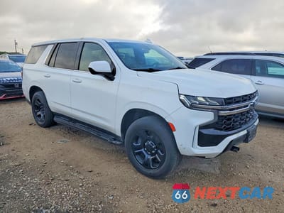 Czwarte zdjęcie samochodu z boku: 2022 CHEVROLET TAHOE C1500 VIN:1GNSCLED9NR247864 - miniatura