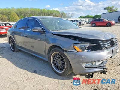 Czwarte zdjęcie samochodu z boku: 2015 VOLKSWAGEN PASSAT S VIN:1VWAT7A34FC097107 - miniatura