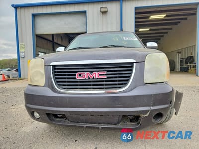 Piąte zdjęcie samochodu w środku: 2010 GMC YUKON XL K1500 SLT VIN:1GKUKKE37AR228573 - miniatura