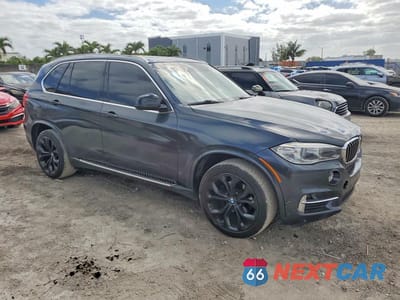 Czwarte zdjęcie samochodu z boku: 2014 BMW X5 SDRIVE35I VIN:5UXKR2C5XE0H31965 - miniatura
