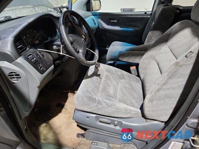 Zdjęcie 7 z 14 samochodu: 2002 HONDA ODYSSEY EX VIN:5FNRL18622B043658 - miniatura