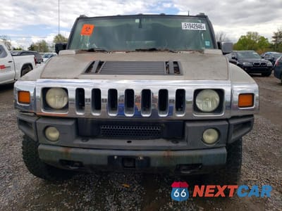Piąte zdjęcie samochodu w środku: 2004 HUMMER H2 VIN:5GRGN23U64H118618 - miniatura