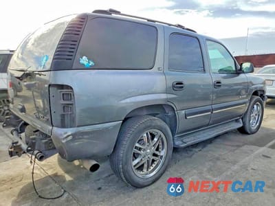 Trzecie zdjęcie samochodu z tyłu: 2002 CHEVROLET TAHOE C1500 VIN:1GNEC13T62R120738 - miniatura