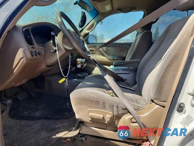 Zdjęcie 7 z 12 samochodu: 2003 TOYOTA SEQUOIA SR5 VIN:5TDZT34A83S155884 - miniatura