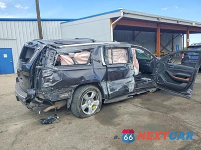 Trzecie zdjęcie samochodu z tyłu: 2018 CHEVROLET SUBURBAN K1500 PREMIER VIN:1GNSKJKC9JR187243 - miniatura