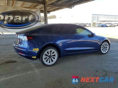 Trzecie zdjęcie samochodu z tyłu: 2021 TESLA MODEL 3 VIN:5YJ3E1EA3MF057404 - miniatura