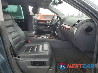 Zdjęcie 7 z 13 samochodu: 2006 VOLKSWAGEN TOUAREG 3.2 VIN:WVGZG77L76D024482 - miniatura