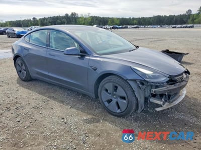 Czwarte zdjęcie samochodu z boku: 2021 TESLA MODEL 3 VIN:5YJ3E1EB8MF923705 - miniatura